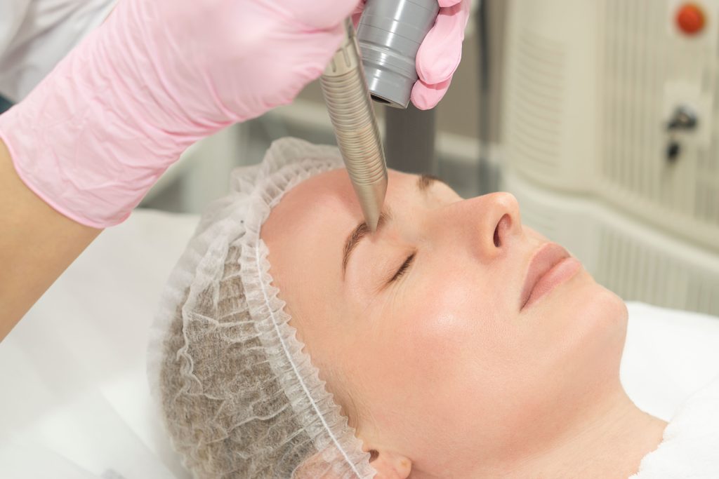 Woman getting beauty treatment | Get cost details of Fotona treatment | A Nu U Aesthetics at Congers, New York