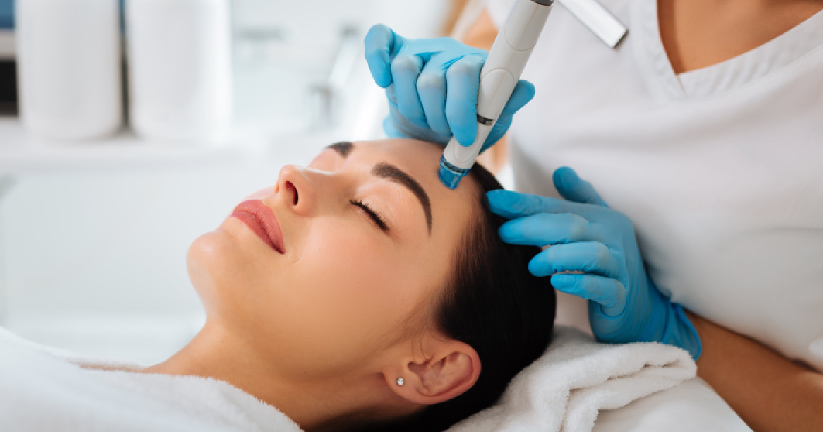 Medical professional performing SCULPTRA® injection near the cheekbone of a female patient representing SCULPTRA® in Congers, NY.