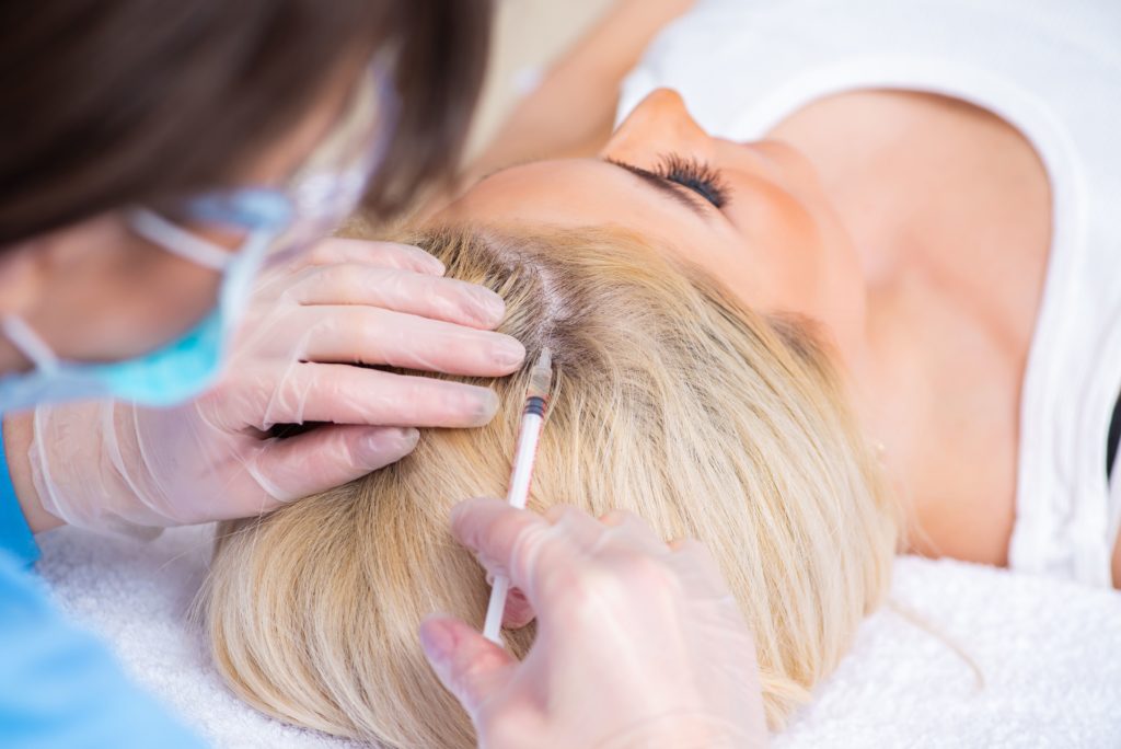 Hair restoration treatment for a Woman | Get cost details of Hair restoration | A Nu U Aesthetics at Congers, New York